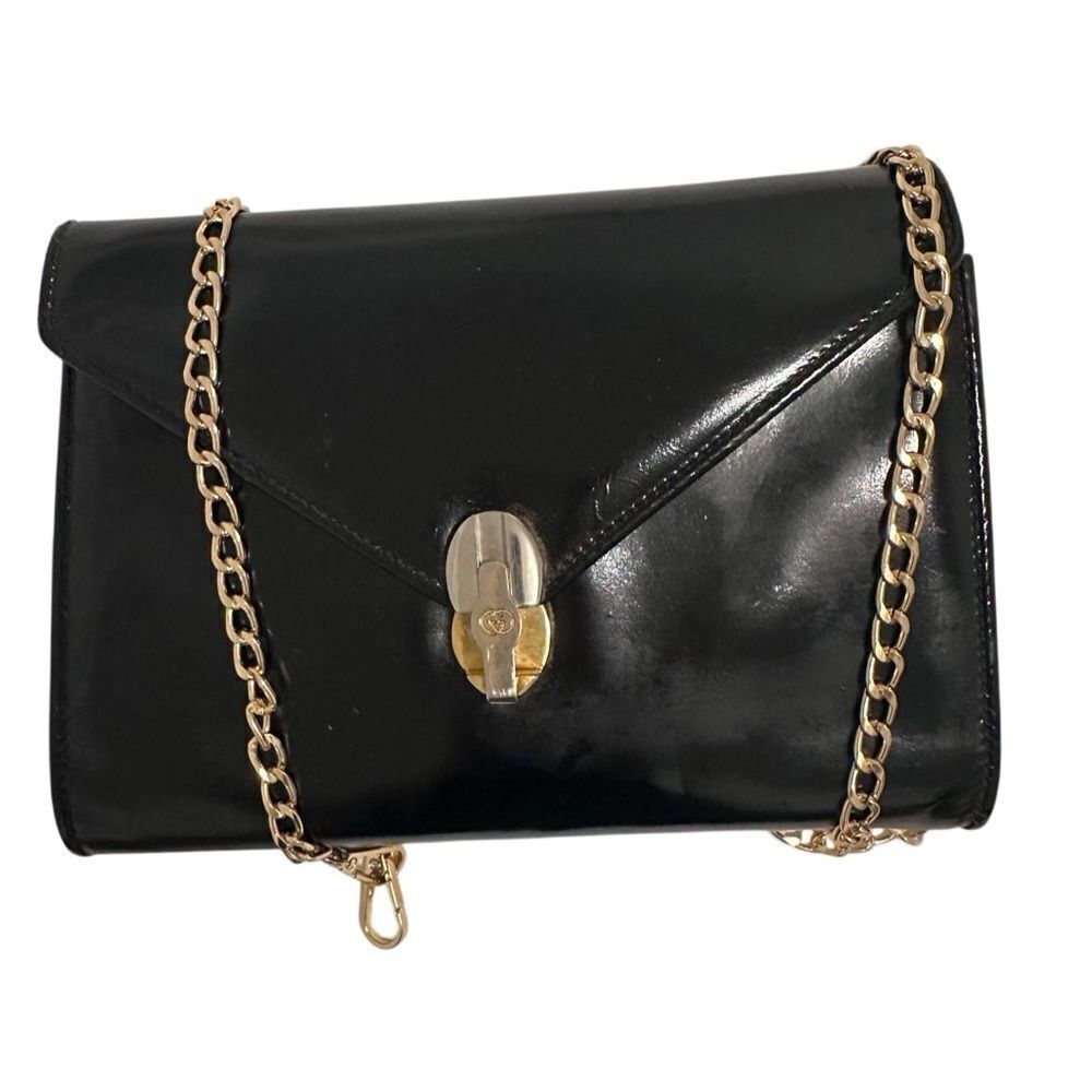 Black and Gold Crossbody Bag with Skull Clasp